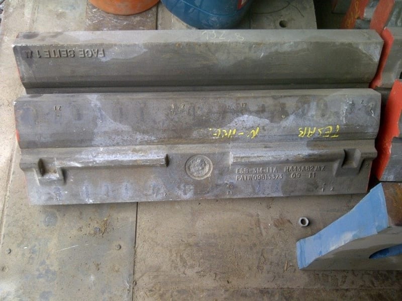 Stedman-fit blow bar castings stacked after heat treatment